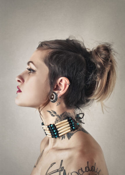 woman-with-tattoos-PLQKNUK